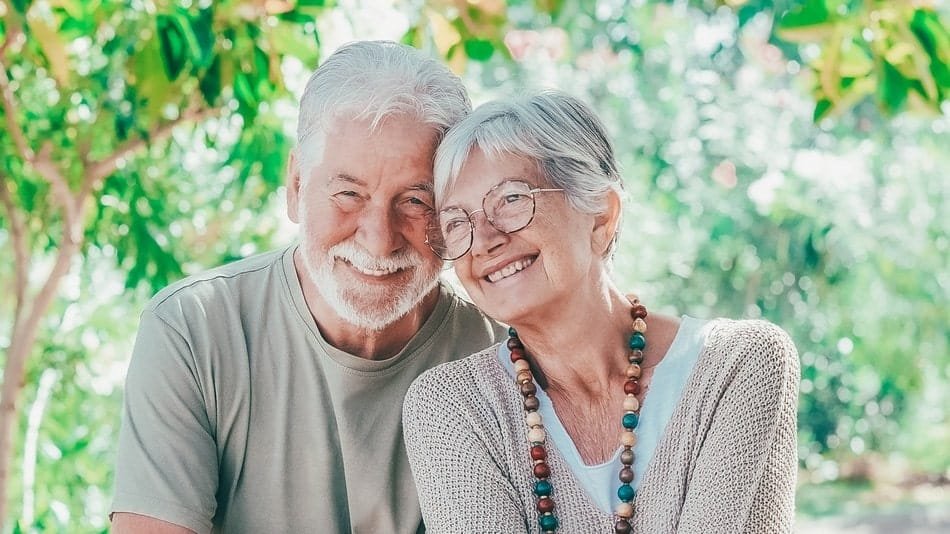 Patients smiling after dental rehabilitation